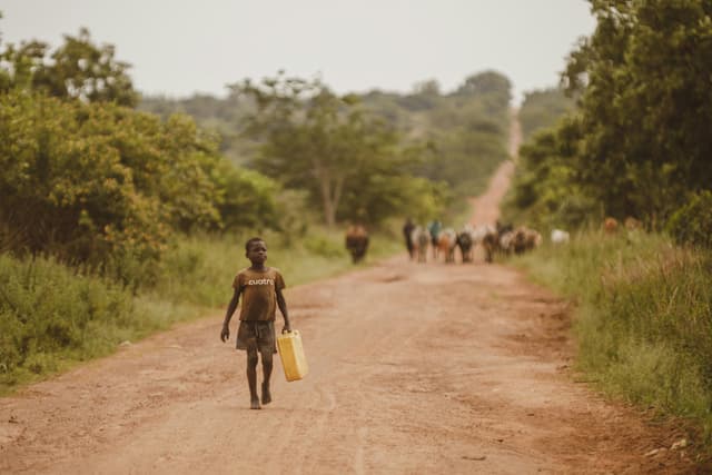 A child going to fetch water